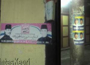 Memasuki masa tenang, Poster Cagub dan Cawagub masih menempel di rumah warga, (9/12).